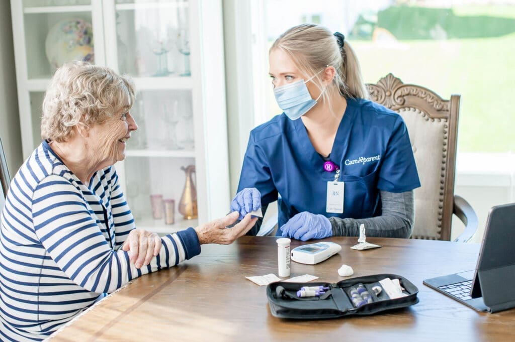 CareAparent Nurse checking the diabetic condition of a senior patient